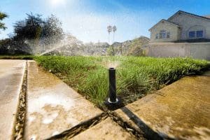 Sprinkler system running on a lawn in Auburndale Florida